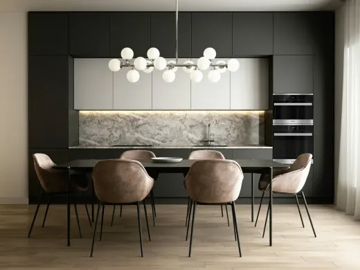 Offene Design-Küche mit Kochinsel in Waldgrün